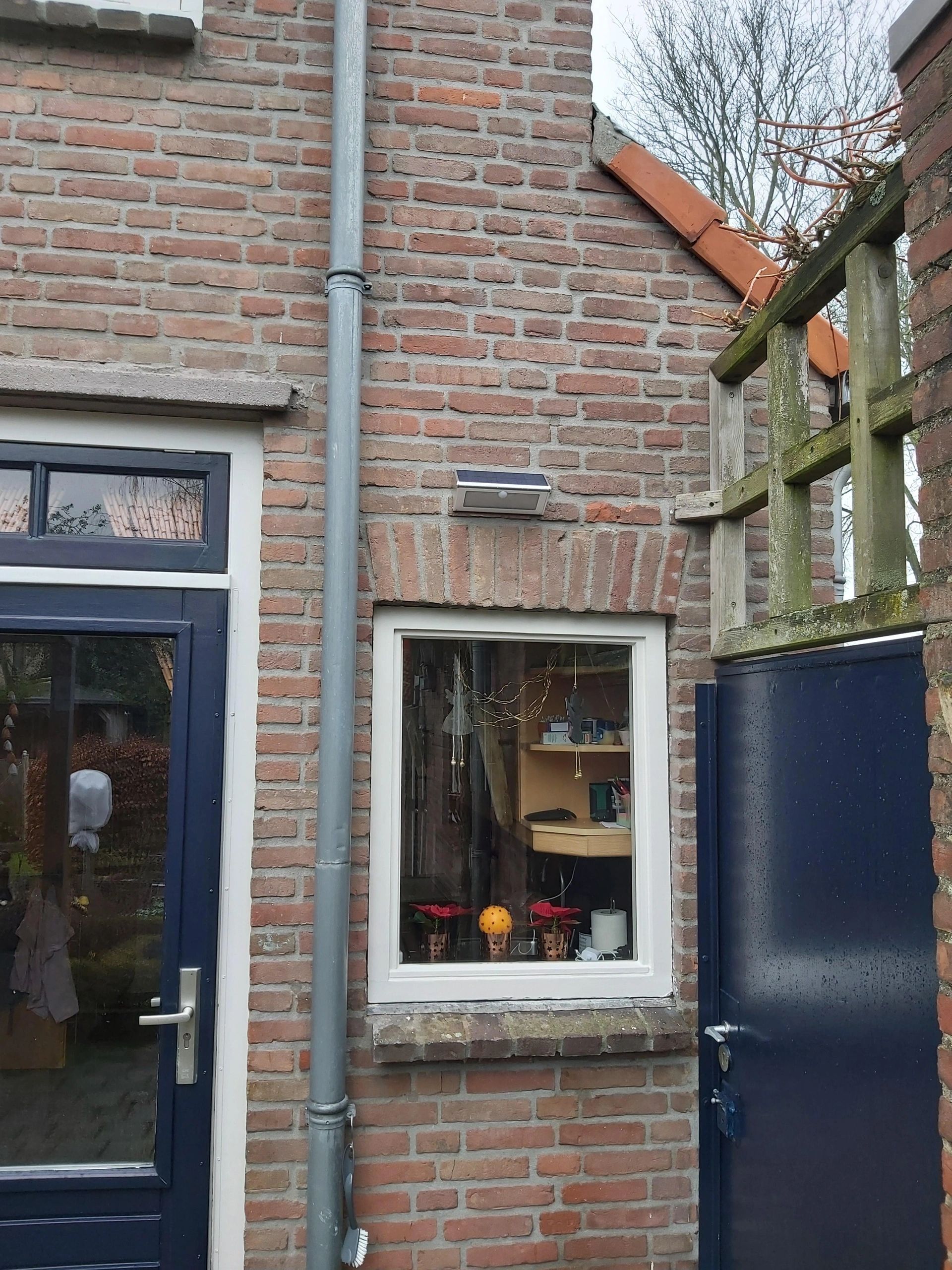 Solar buitenlamp wandlamp Motion V met bewegingsmelder op zonne energie